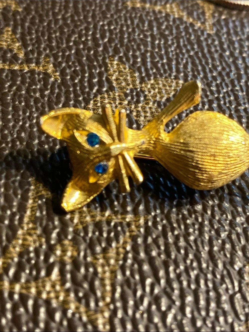 Vintage Whimsical Textured Gold Cat Pin Blue Rhinestone Eyes Articulated Tail